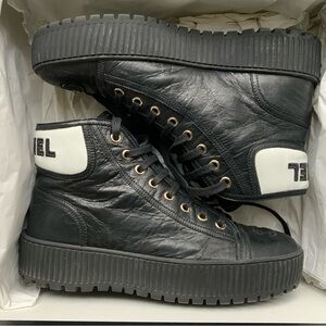 CHANEL Black High-Top leather Sneakers with White Accents